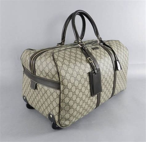 gucci suitcase with wheels|Gucci carry on duffle bag.